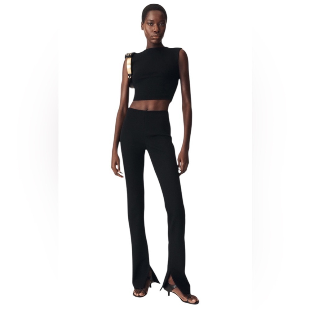 Zara Sleek Black Skinny Pants with Zippered Hem. Size 26